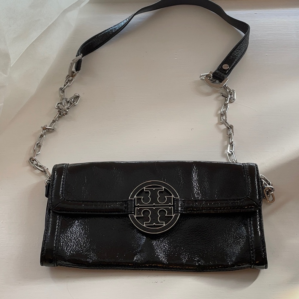 Tory Burch cross body purse with silver chain strap. Never used